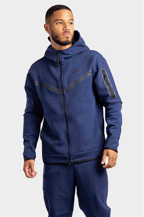 donkerblauw nike tech pak|Nike tech pack.